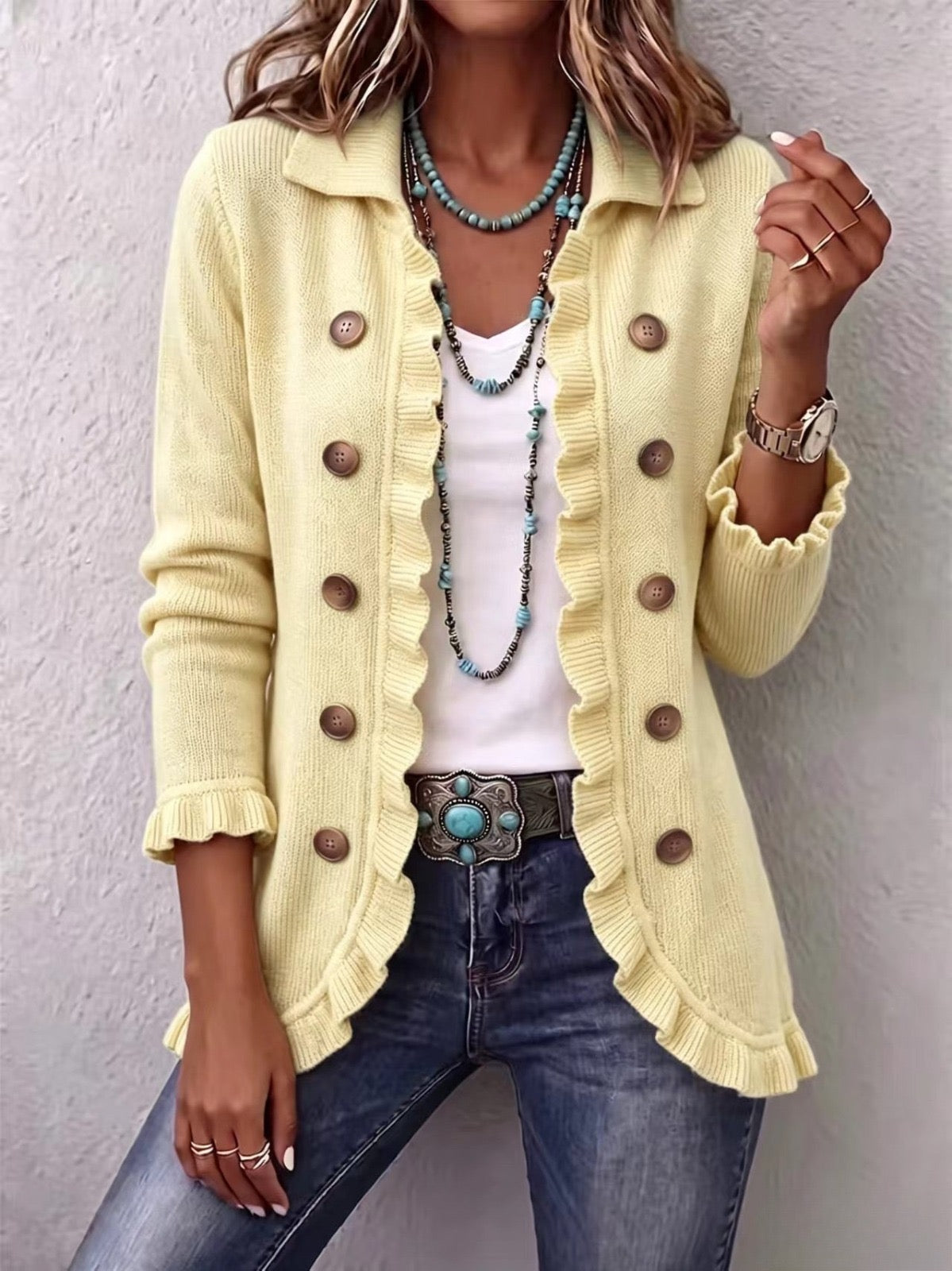 Orlane | Cremefarbene Rippstrickjacke mit Rüschen